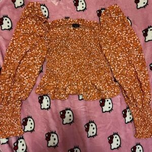 Chic Orange Floral Smocked Top